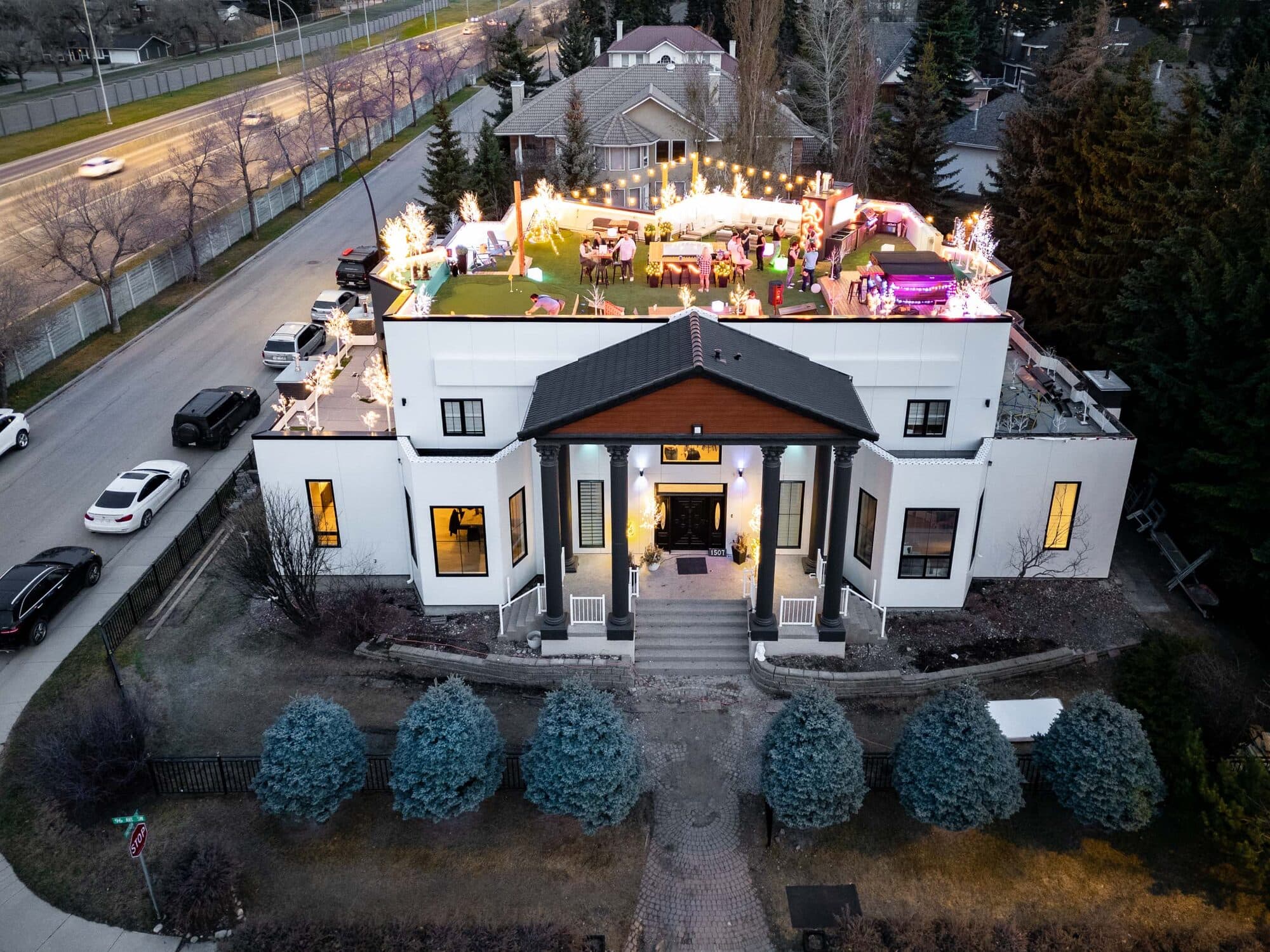 Gargoyle House rooftop after — 2,991 sq ft permitted patio with putting green and outdoor kitchen