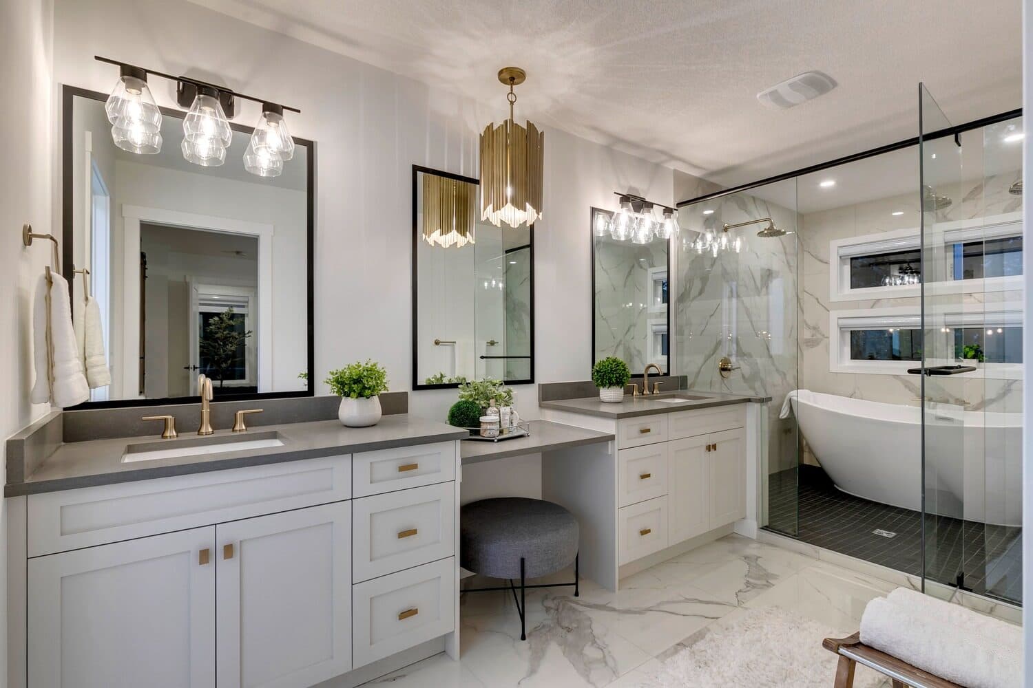 Bannerman Drive ensuite with glass shower and gold fixtures