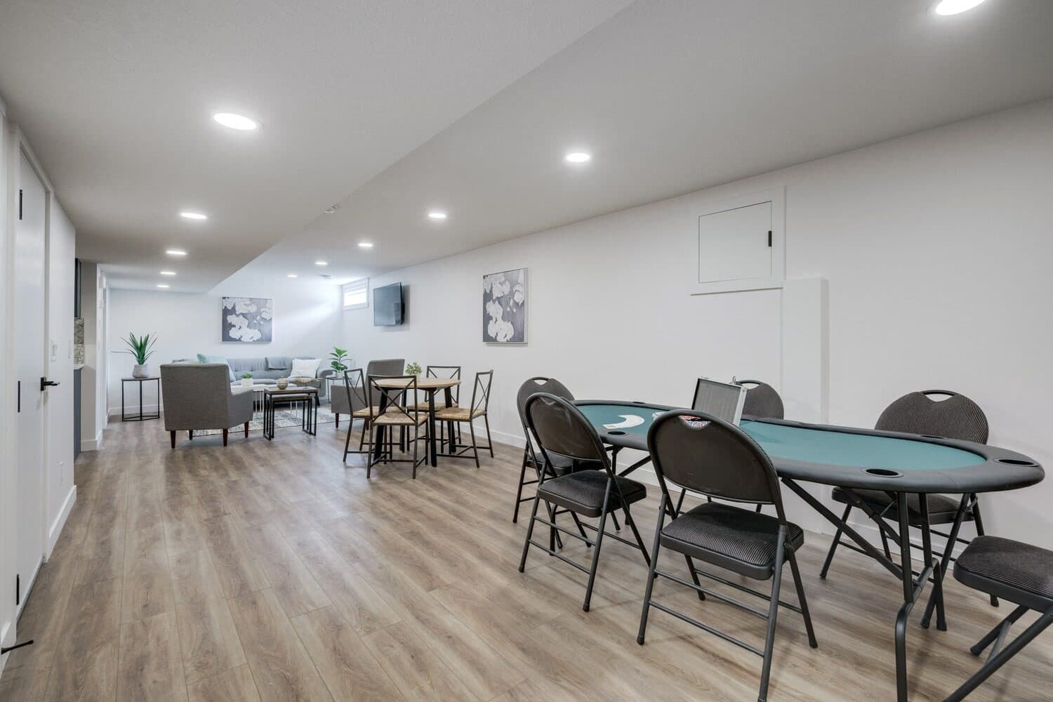 Lincoln Drive basement with games and dining area