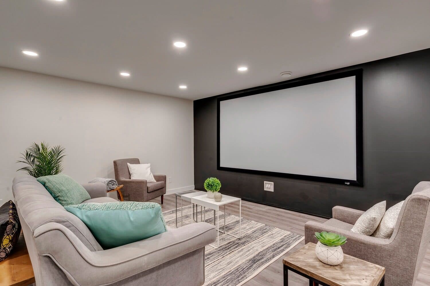 Parkridge basement home theatre with projection screen