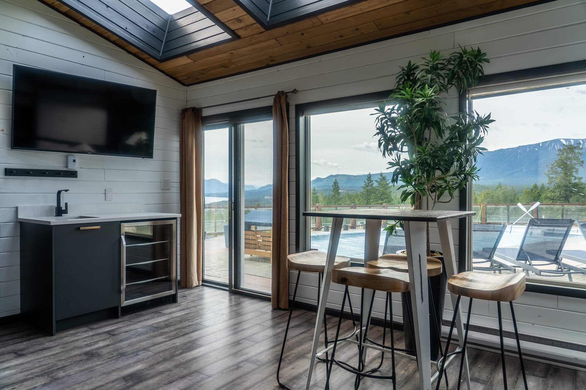 Pool house bar with valley views at the Reimagine Ranch