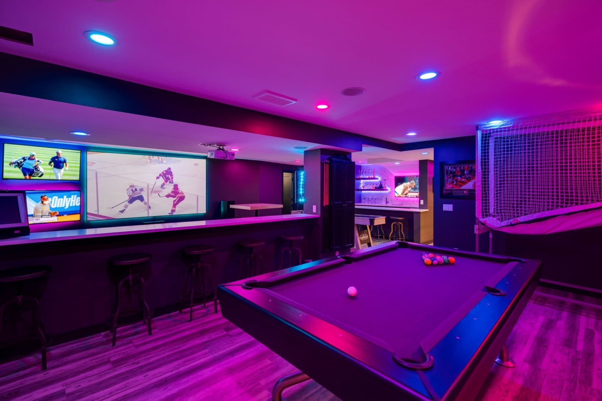 Basement rec room with pool table, LED lighting and bar area