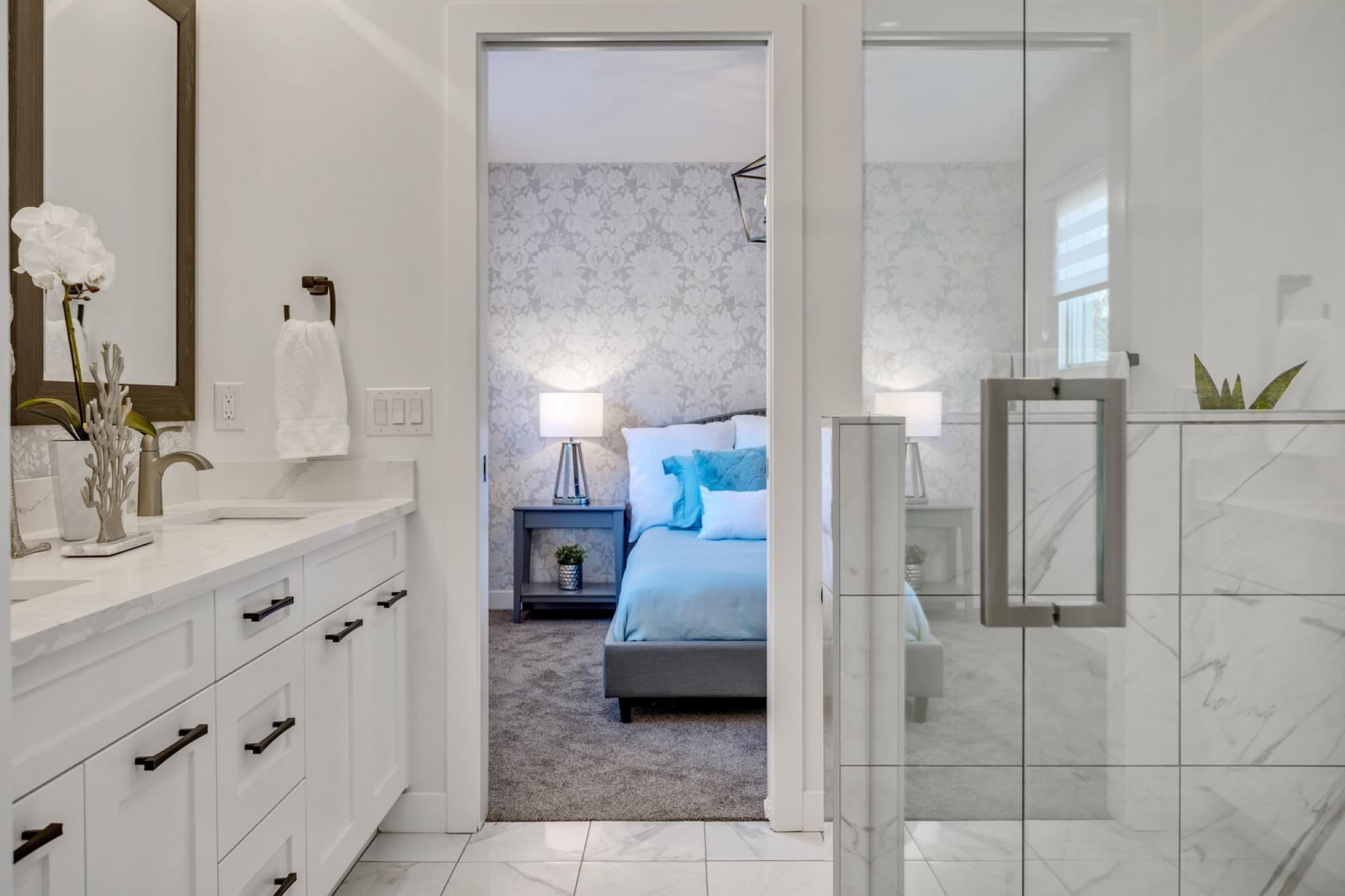 Ensuite vanity with view through to suite bedroom