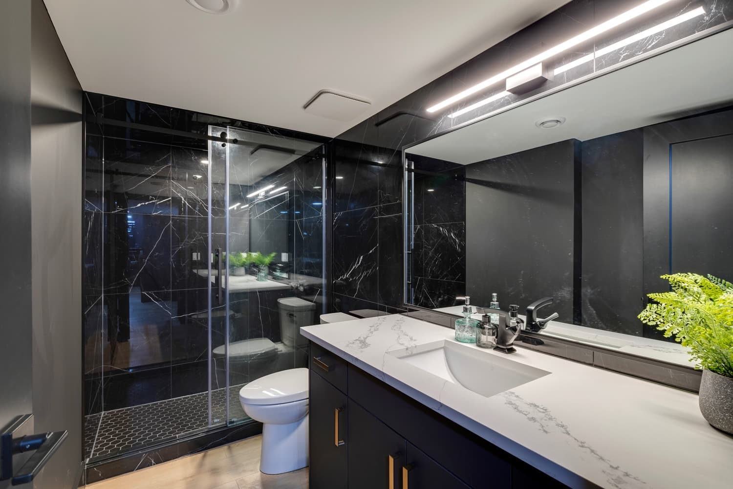 Finished basement bathroom with tiled shower in Calgary