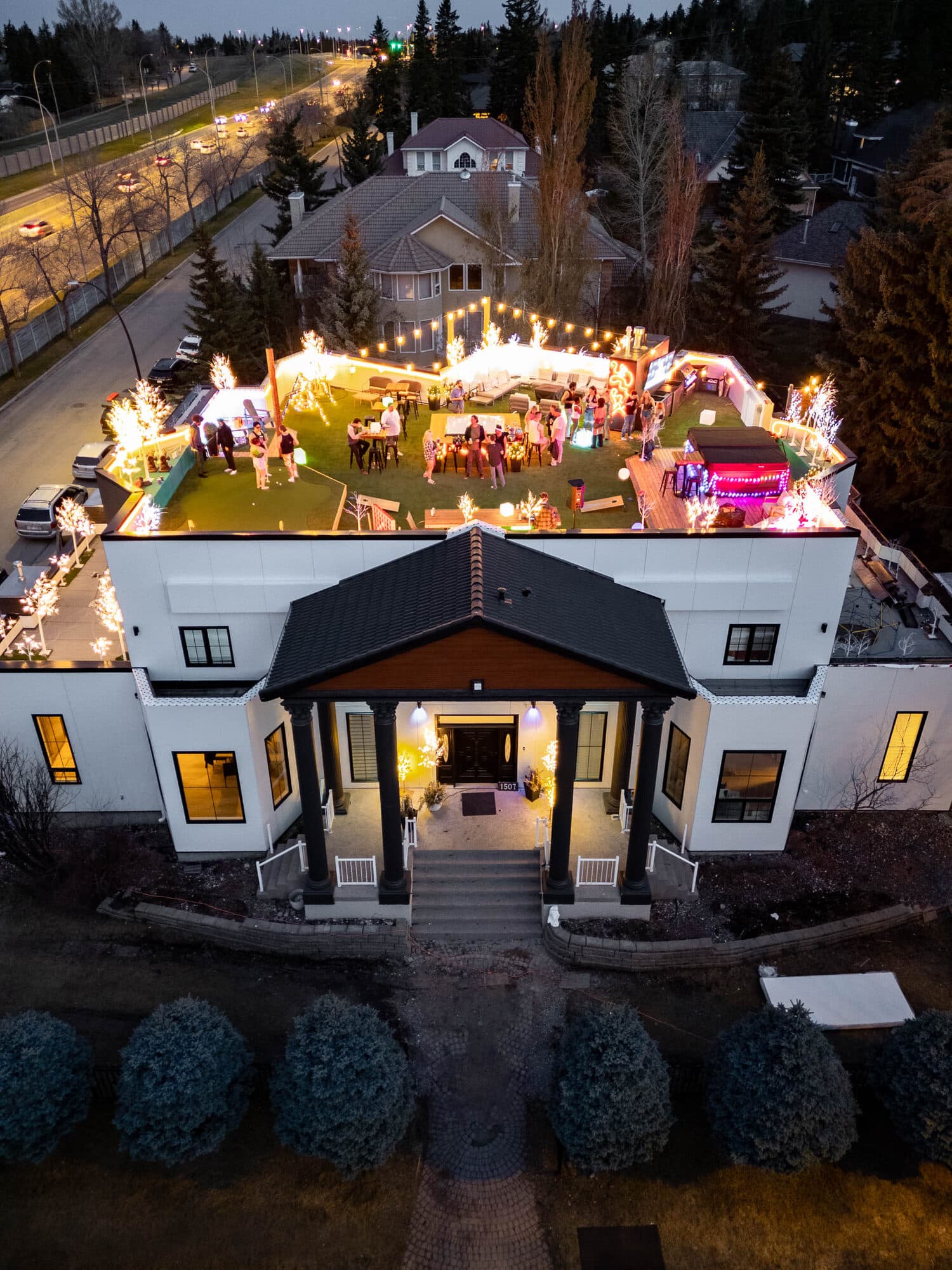 The Gargoyle House — Calgary exterior with portico, by drone