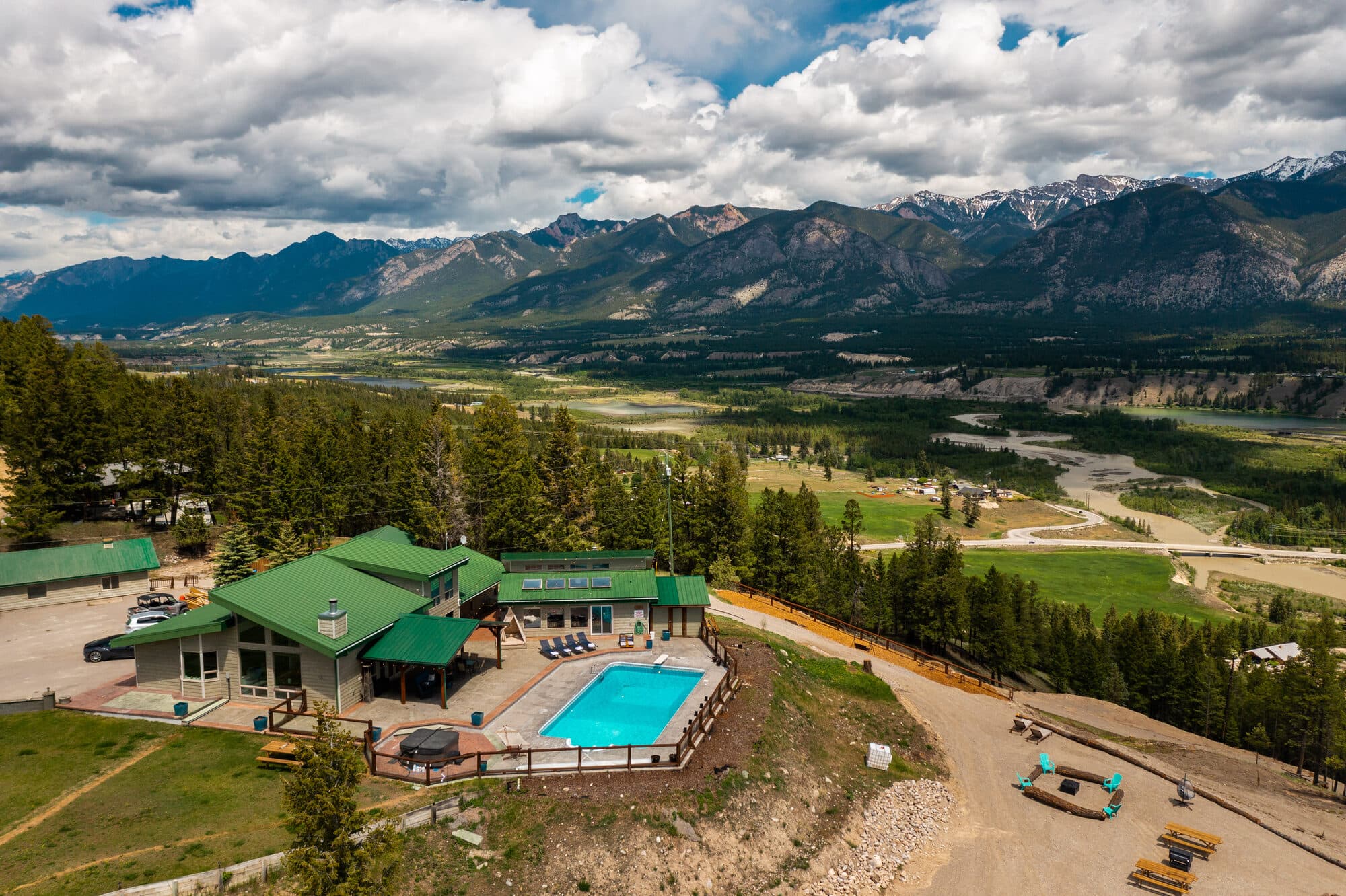 The ReImagine Ranch — pool deck with mountain views