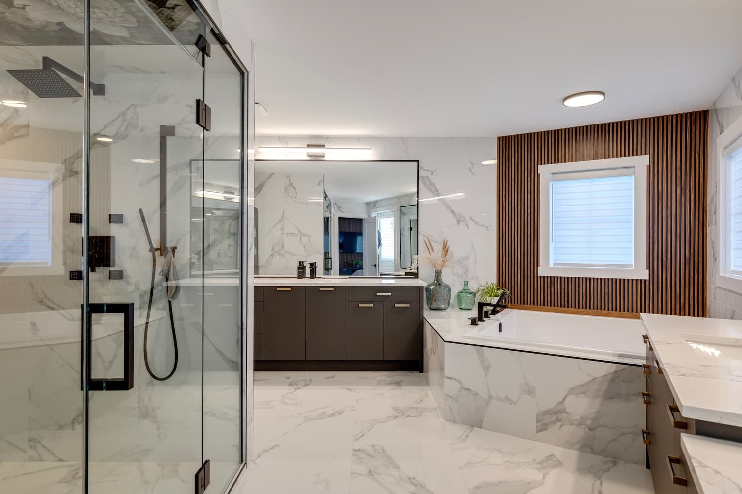 Basement ensuite bathroom with custom vanity in a Calgary home